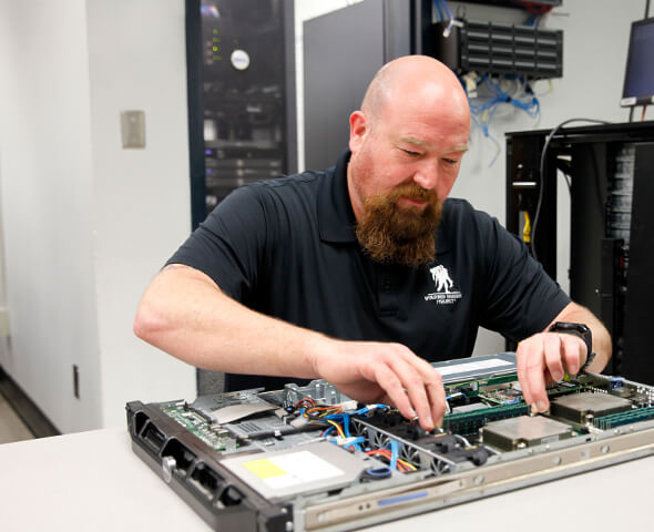 FHTC Network Technology student working on server tray